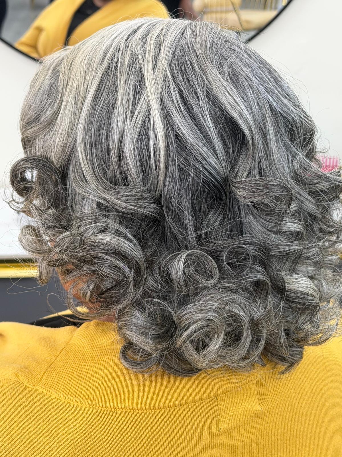 Silk press roller set result at Sinkor Beauty Salon